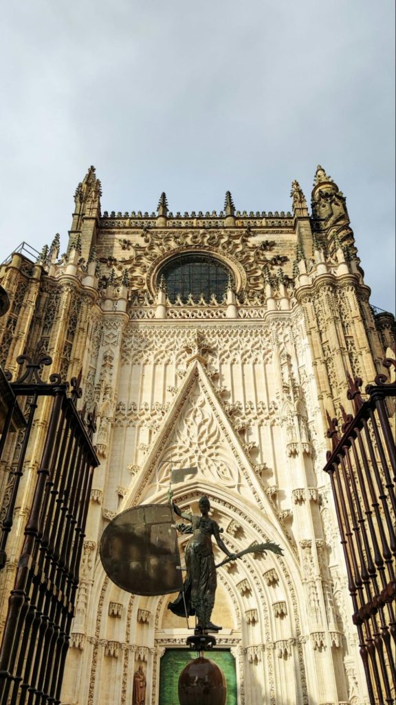 Facade of Seville Cathedral with Giralda entrance