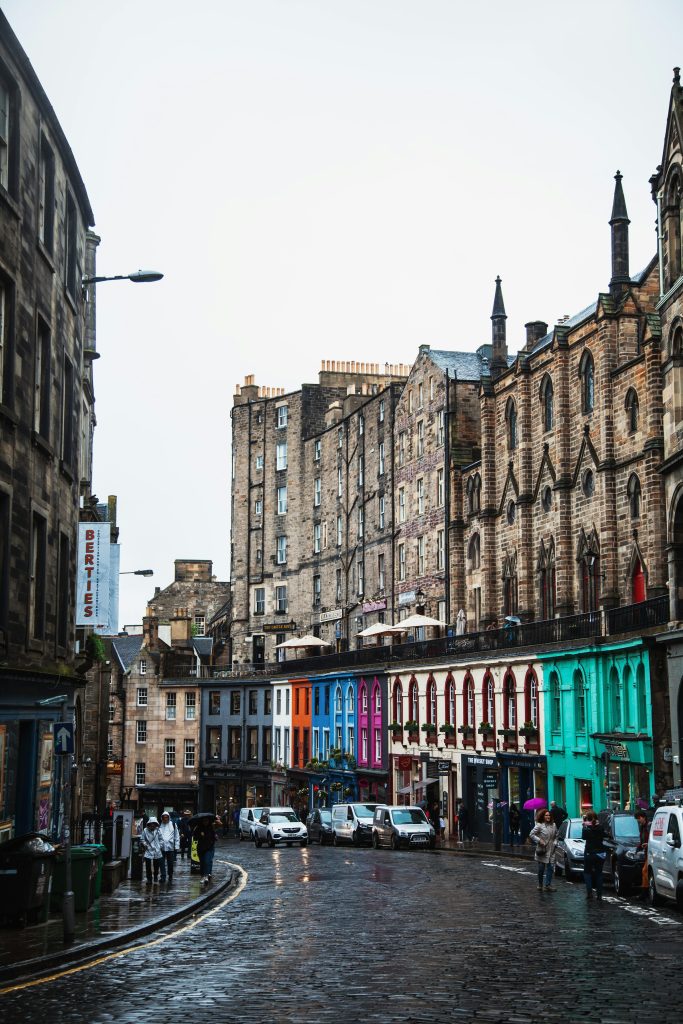 Colorful buildings on cobbled Edinburgh street