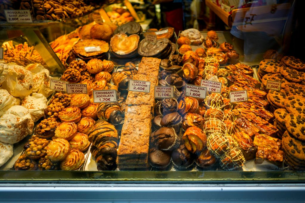Display of pastries and baked goods in a Barcelona bakery