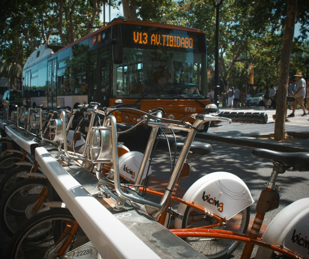 Bicing bicycles and a city bus in Barcelona